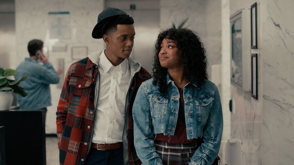 Jabari Banks as Will and Simone Joy Jones as Lisa walking through hospital in Bel-Air season 2