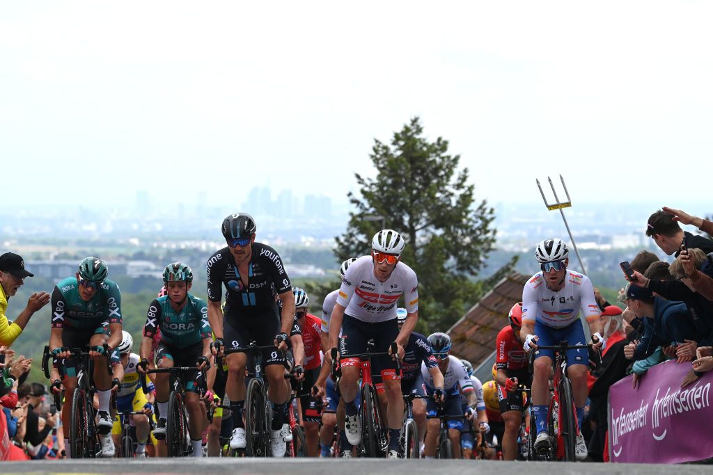 FRANKFURT AM MAIN GERMANY MAY 01 LR Nils Politt of Germany and Team Bora Hansgrohe John Degenkolb of Germany and Team DSM Otto Vergaerde of Belgium and Team Trek Segafredo and Valentin Ferron of France and Team Total Energies compete while fans cheer during the 59th EschbornFrankfurt 2022 a 185km one day race from Eschborn to FrankfurtamMain WorldTour on May 01 2022 in Frankfurt am Main Germany Photo by Stuart FranklinGetty Images