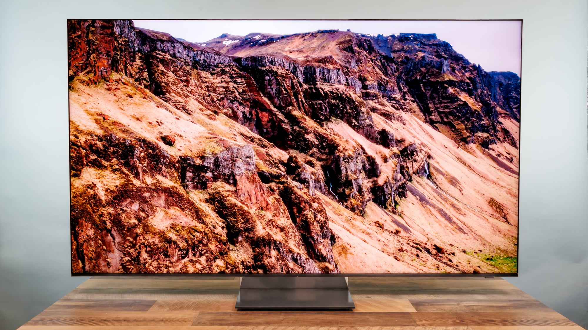 A Samsung R95H Micro RGB TV on a desk