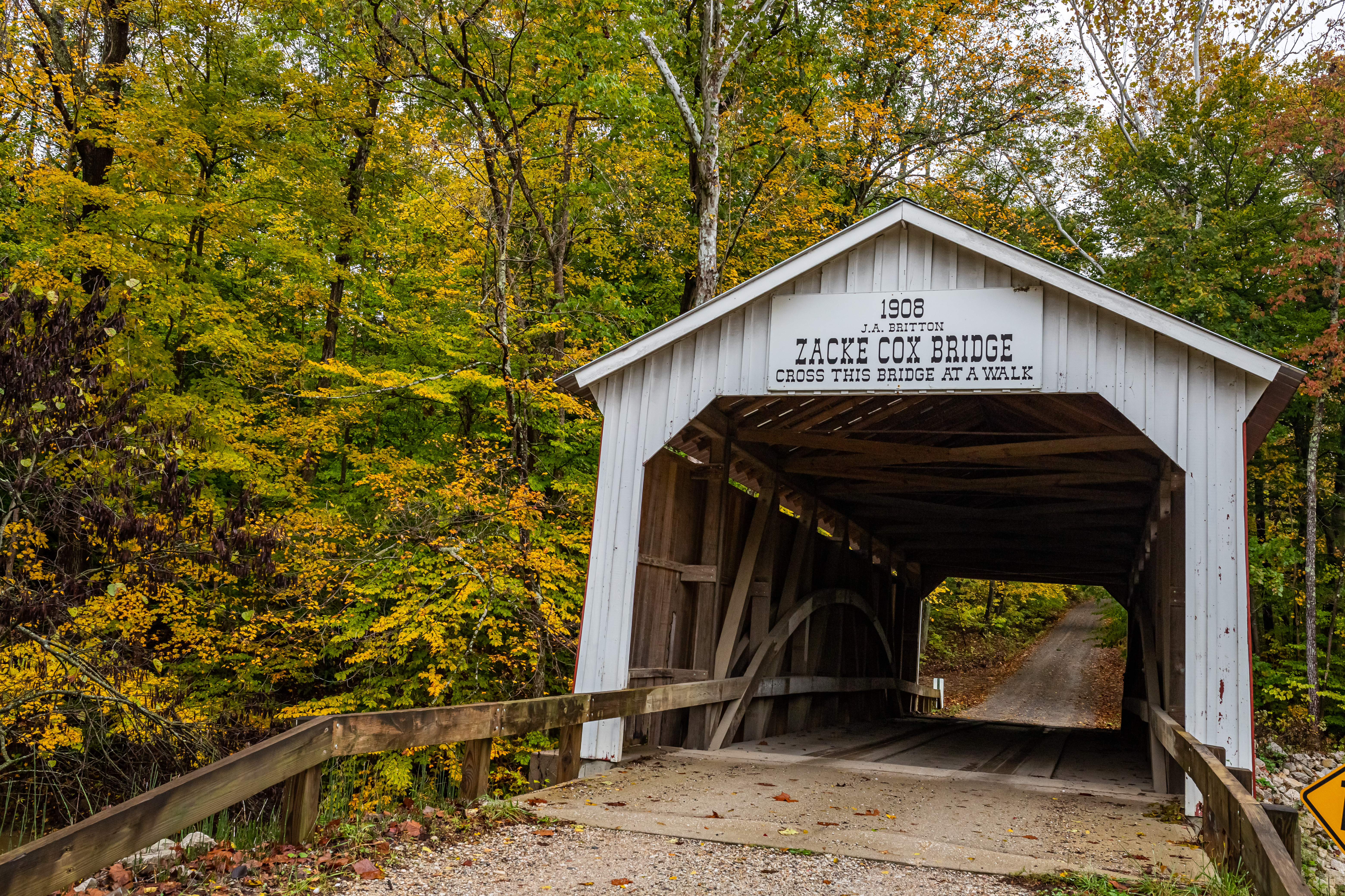 The Zacke Cox Bridge surrounded by fall foliage