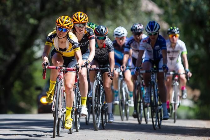 Leah Kirchmann on the front with only two Optum p/b Kelly Benefits Strategies left to chase the break