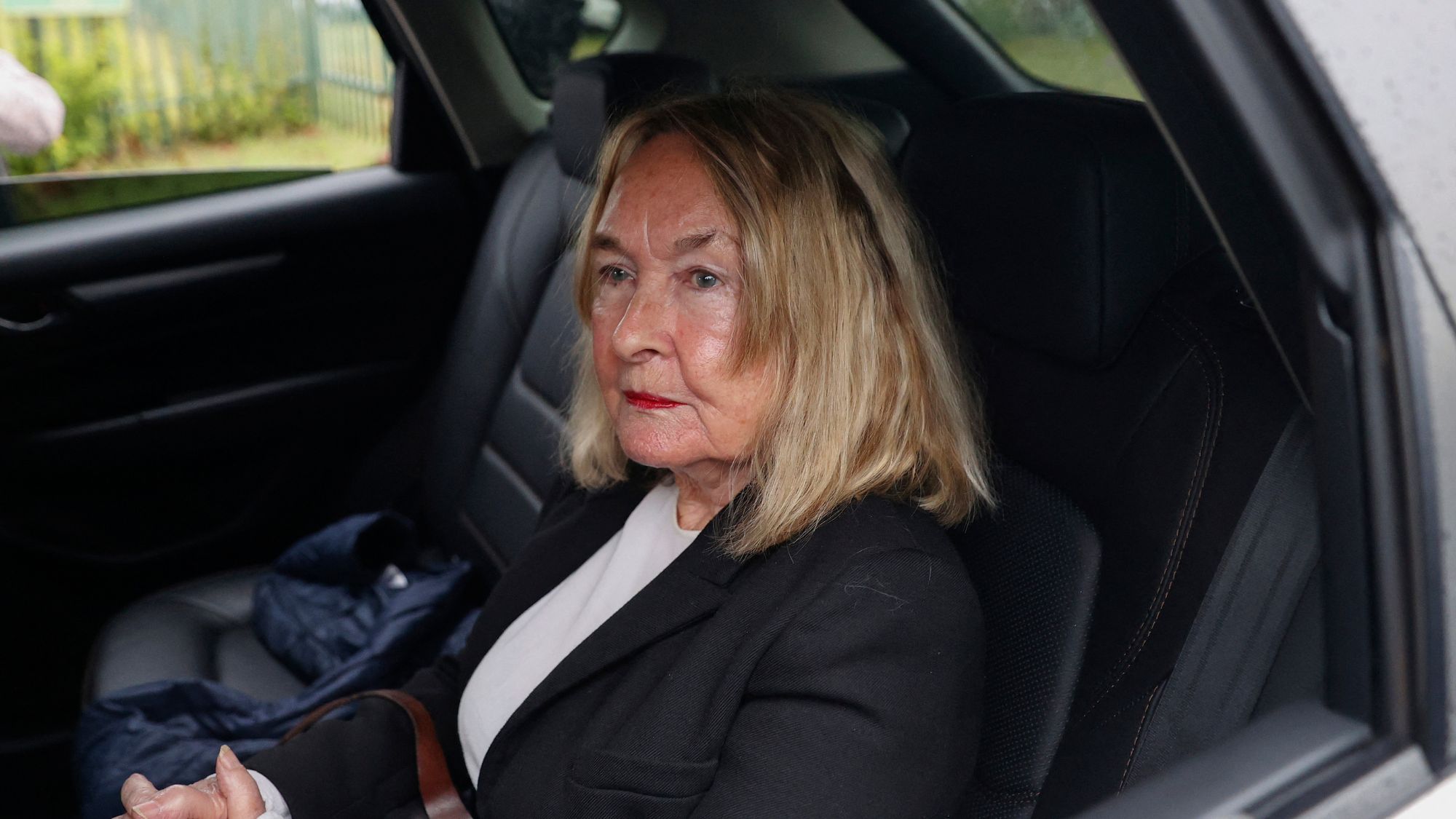 June Steenkamp sits in a car at the Atteridgeville Correctional Centre in Pretoria