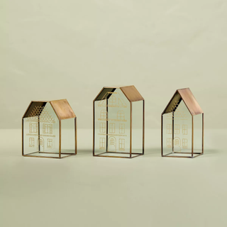 three glass decorative houses