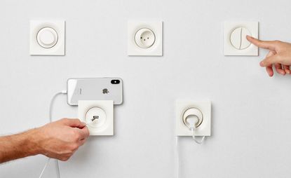 Light switches and electric sockets made from bone powder by Souhaib Ghanmi