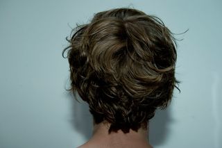 tousled hair on back of male models head