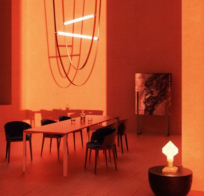 A vignette featuring a dining room scene immersed in orange light