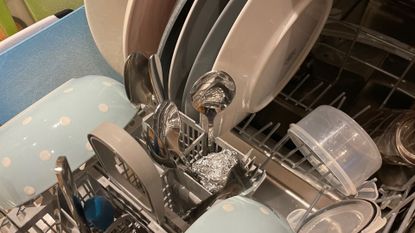 Can the tin foil dishwasher hack guarantee extra shine? | Woman & Home