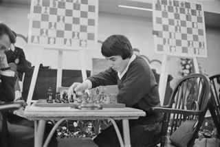 Nona Gaprindashvili of the Soviet Union, pictured playing a game of chess at the International Chess Congress in London on 30th December 1964.