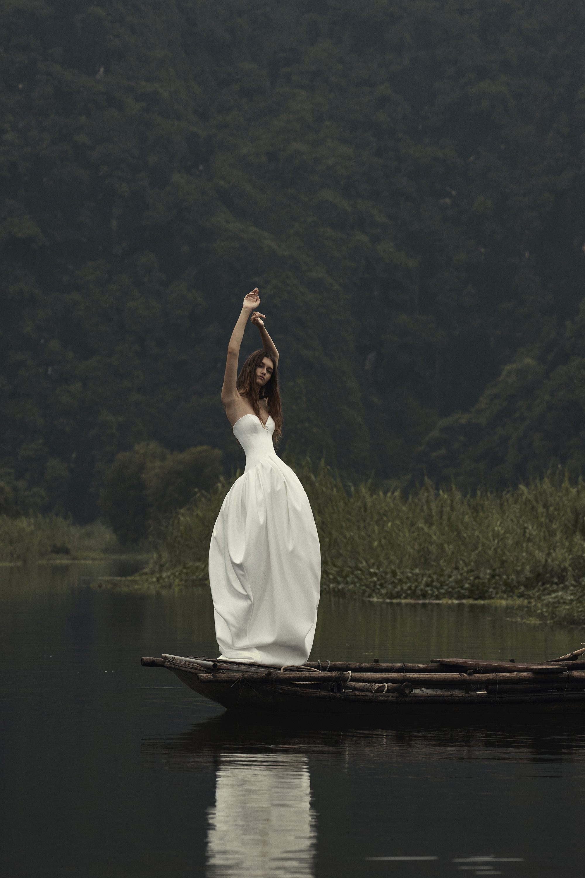 Photo of model wearing Kyha Studios wedding dress.