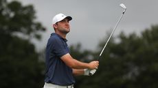 Scottie Scheffler plays his shot from the fifth tee during the Travelers Championship. 