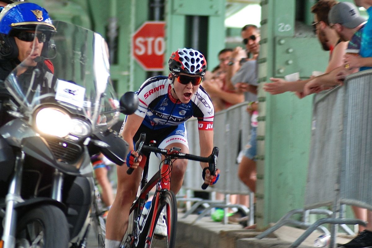 A Twenty 16 rider is cut off by the race moto and gives him a few words