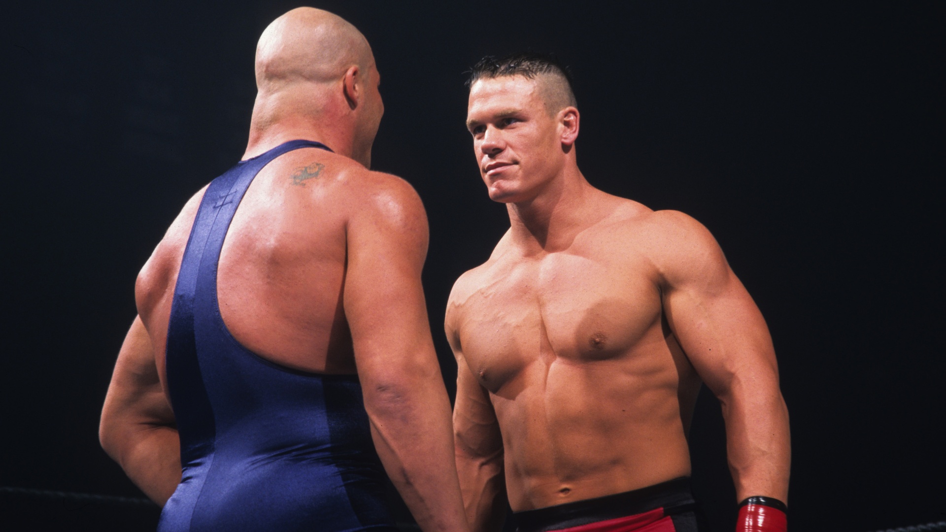 John Cena staring down Kurt Angle on his WWE debut at SmackDown on June 25, 2002