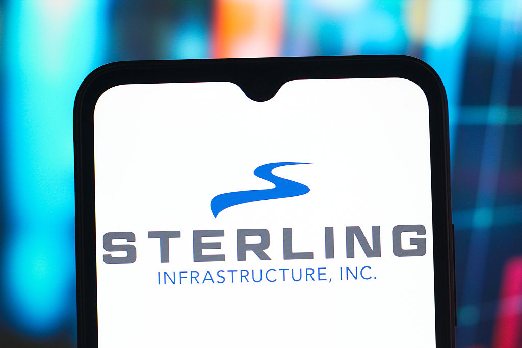 sterling infrastructure blue s logo on mobile phone