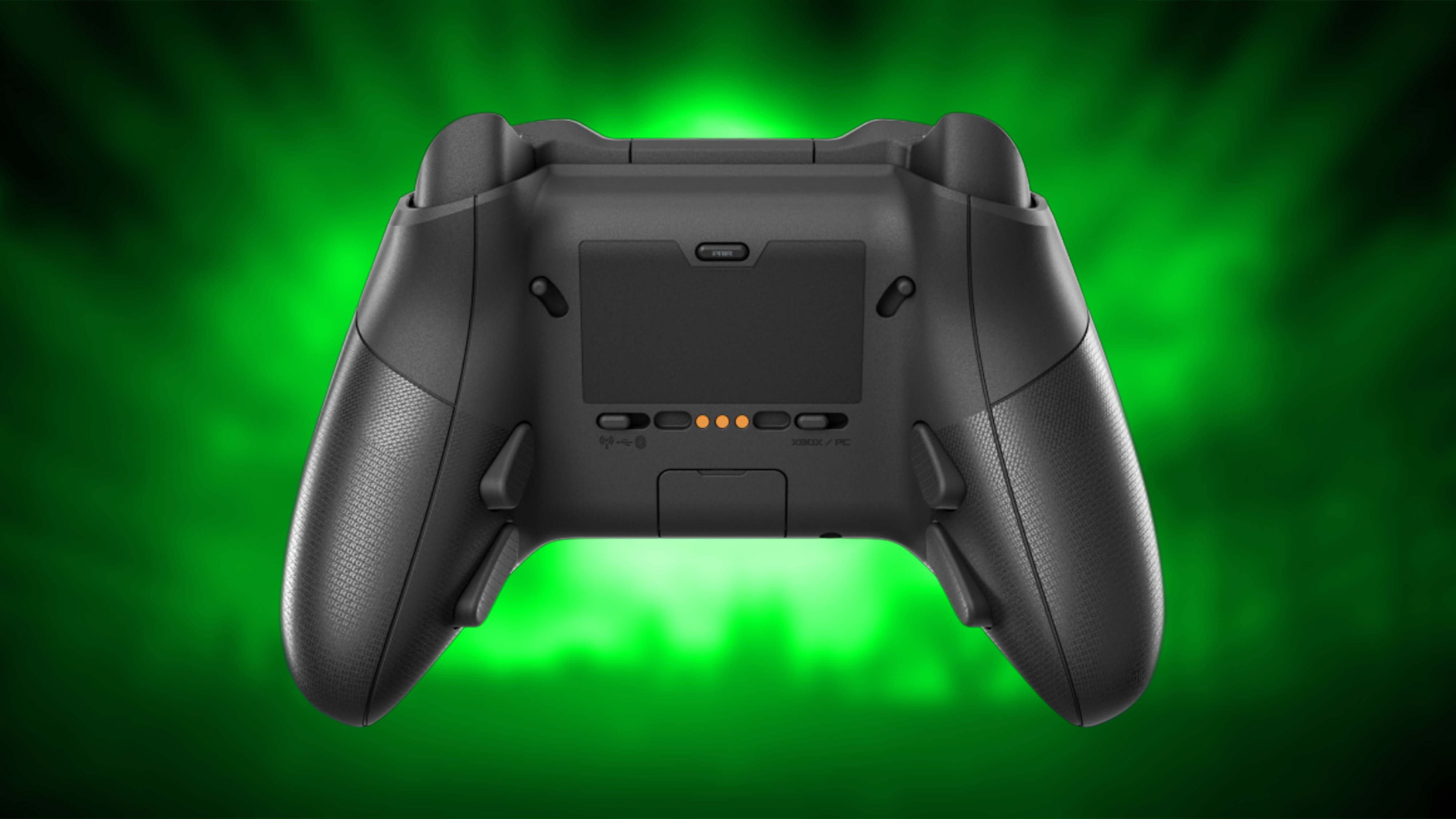 Backside of the ROG Raikiri II Xbox Wireless on a green background.