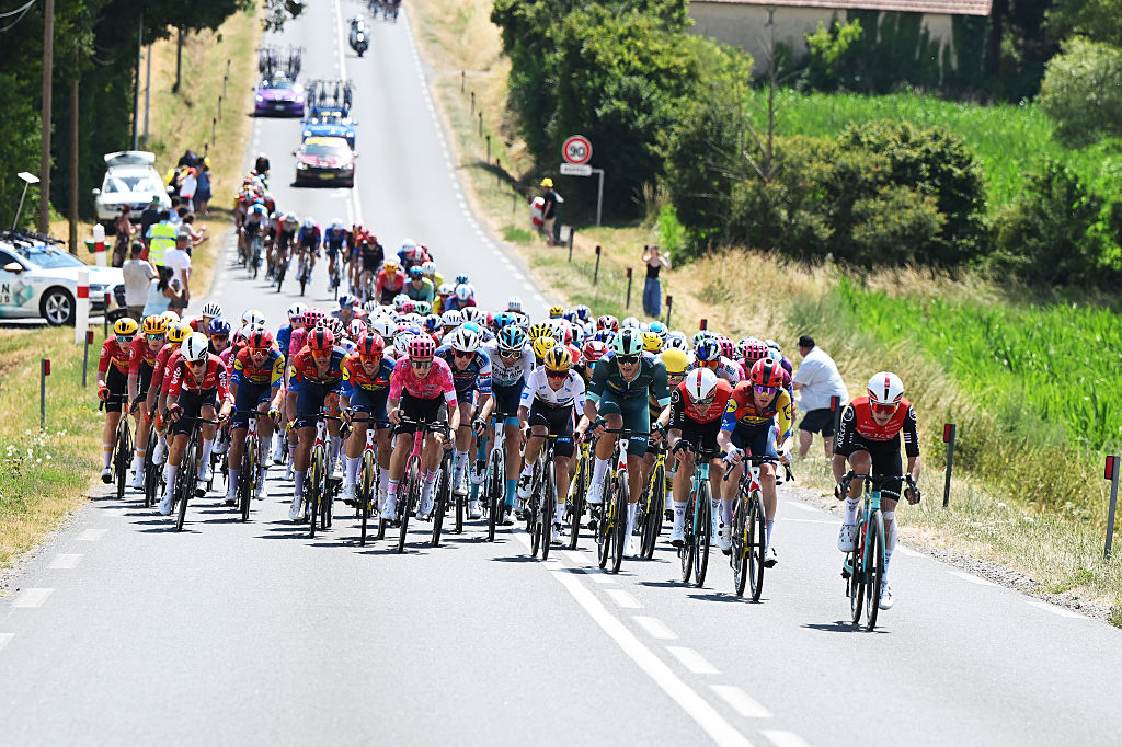 CHATEAUROUX, FRANCE - JULY 13: (L-R) Remco Evenepoel of Belgium and Team Soudal Quick-Step - White best Young Rider Jerse, Jonathan Milan of Italy and Team Lidl - Trek - Green Sprint Jerse, Raul Garcia Pierna of Spain and Team Arkea - B&B Hotels and Mattias Skjelmose of Denmark and Team Lidl - Trek lead the peloton during the 112th Tour de France 2025, Stage 9 a 174.1km stage from Chinon to Chateauroux ) / #UCIWT / on July 13, 2025 in Chateauroux, France.