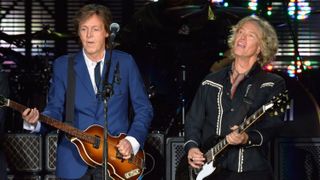 Paul McCartney performs with guitarist Brian Ray on August 10, 2014 in Los Angeles