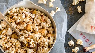 A pan of freshly popped popcorn to show what not to cook in an air fryer