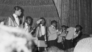 Jimi Hendrix onstage with The Isley Brothers in 1964