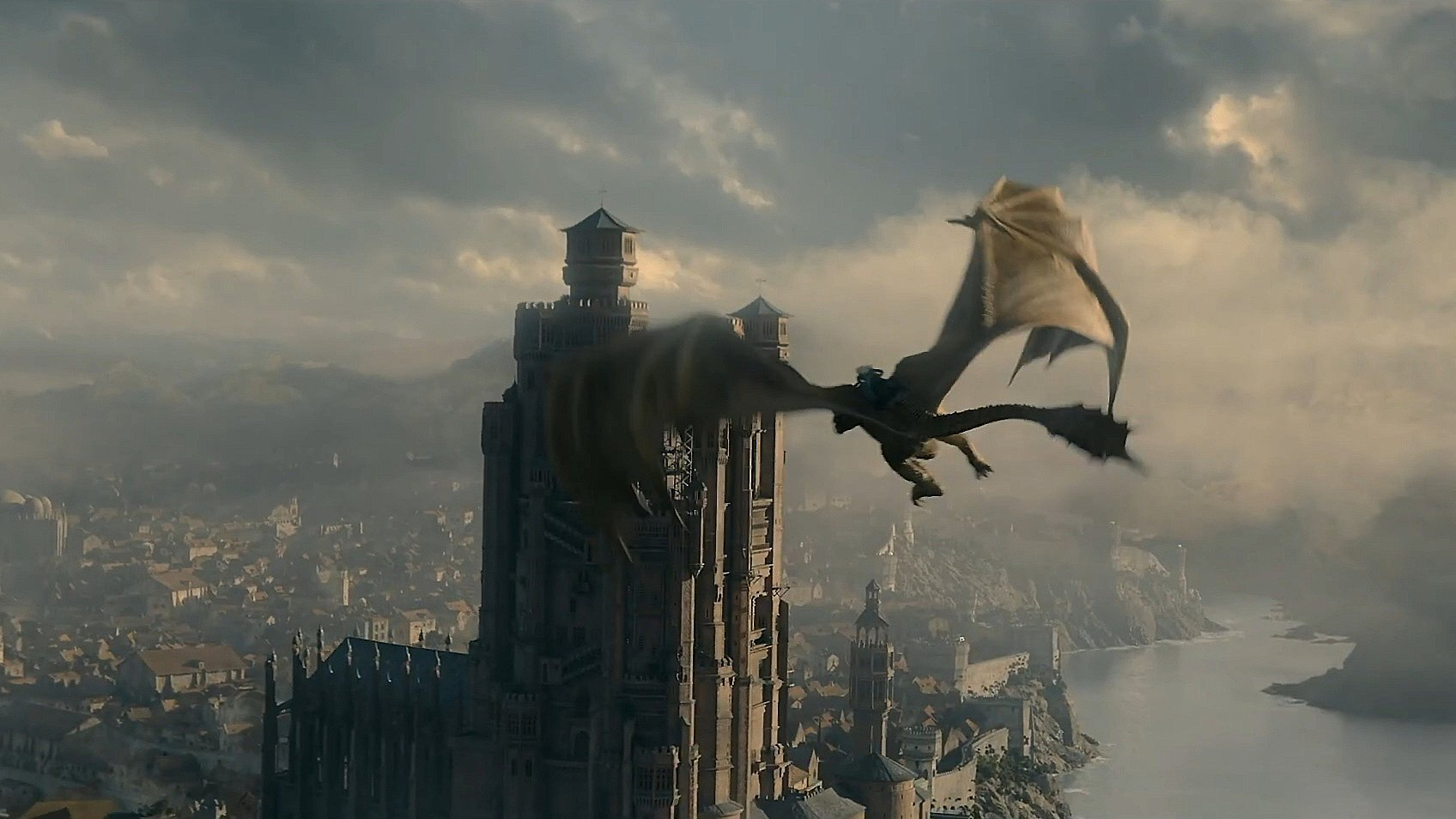 A dragon flies towards the main castle of House Targaryen in House of the Dragon on HBO Max
