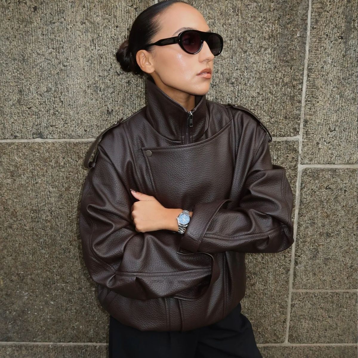 Ingrid wears brown leather jacket