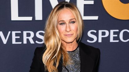 Sarah Jessica Parker, wearing a sparkly dress and long black coat, attends the SNL50: The Anniversary Special at 30 Rockefeller Center on February 16, 2025