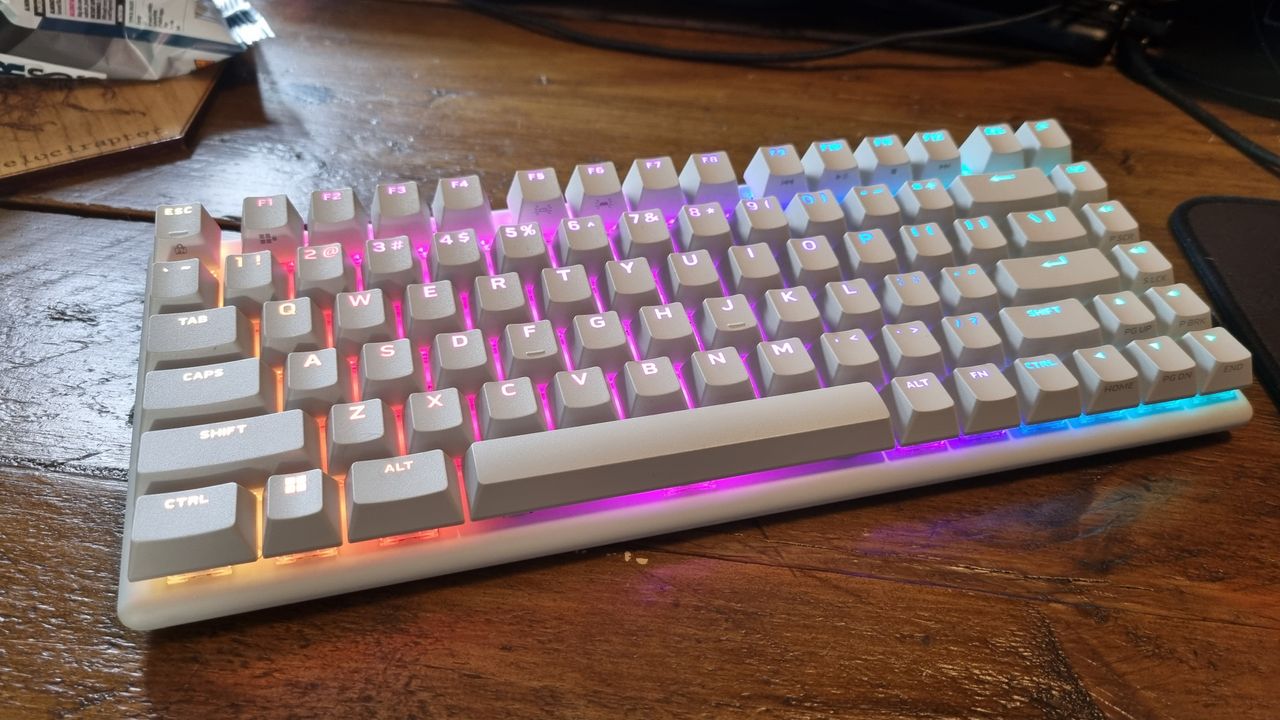 The Alienware Pro Wireless Gaming Keyboard, lit up in rainbow RGB lighting
