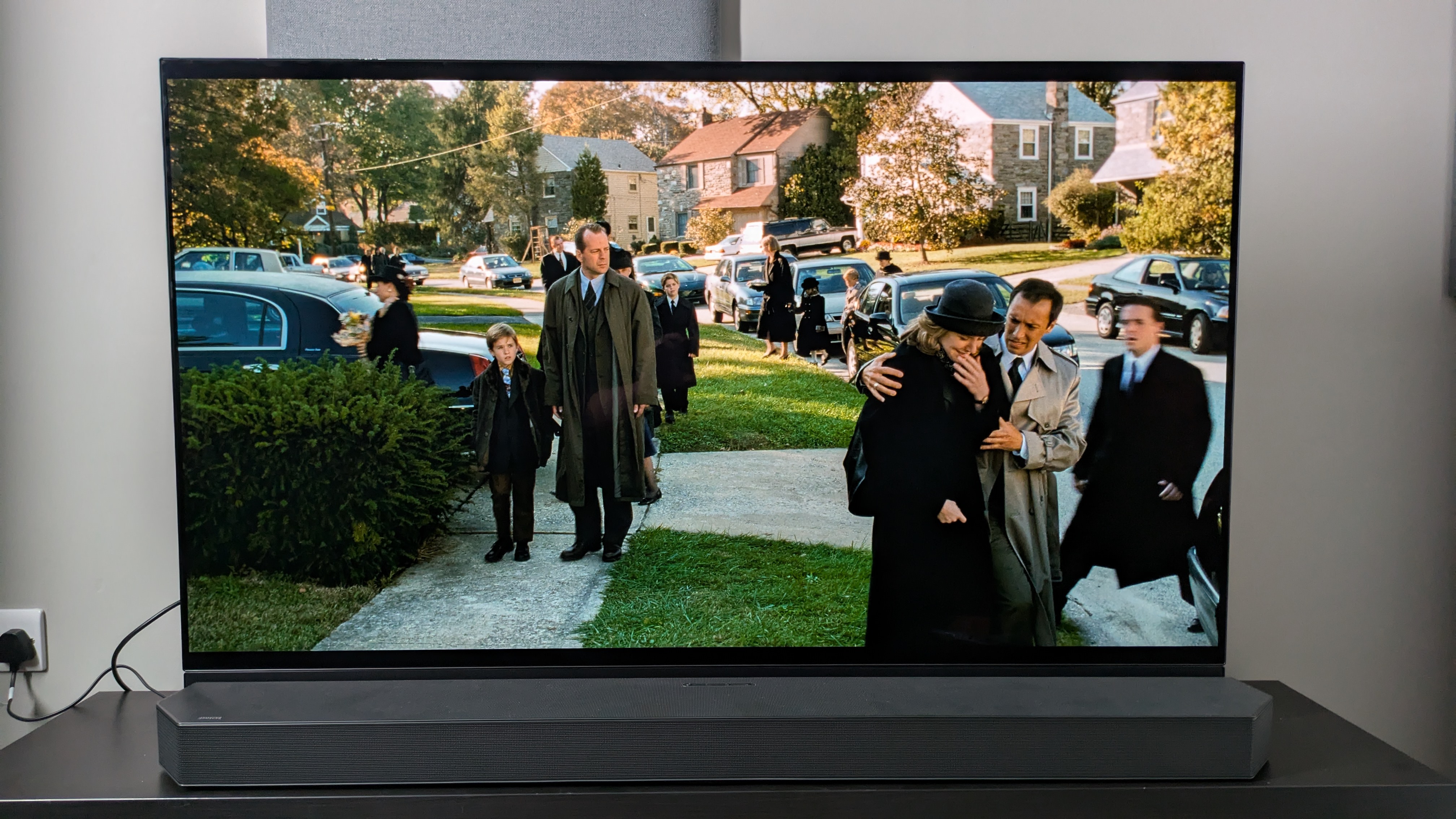 The Sixth Sense funeral scene on Panasonic MZ1500 OLED TV with Samsung HW-Q990C soundbar in front of tv