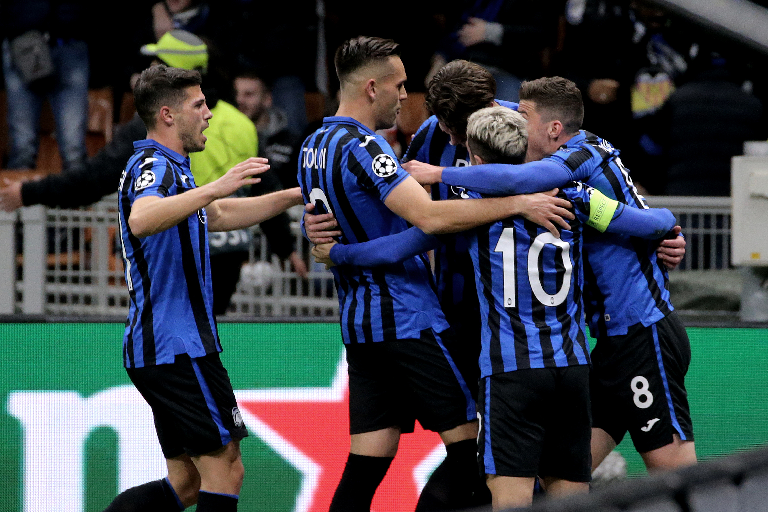 Atalanta players celebrate a goal against Valencia in the Champions League in February 2020.