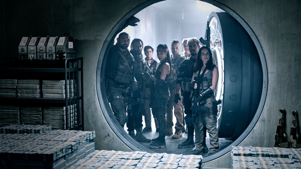 From left, Dave Bautista as Scott Ward, Omari Hardwick As Vanderohe, Tig Notaro as Peters, Samantha Win as Chambers, Colin Jones as Damon, Matthias Schweigh&ouml;fer as Dieter,Ra&ugrave;l Castillo as Mickey Guzman, and Ana De La Reguera as Cruz in Netflix's "Army of the Dead."