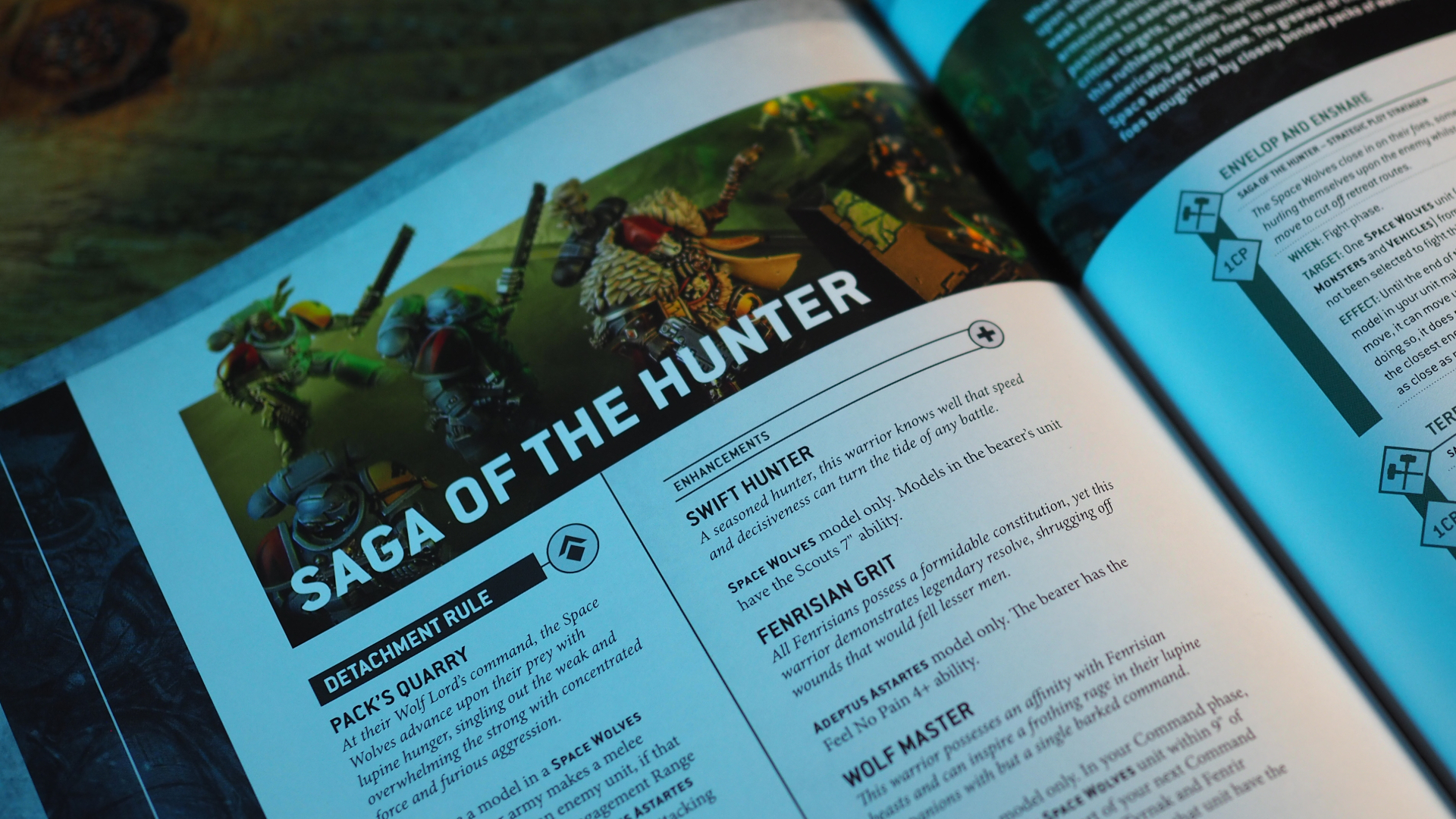 Space Wolves Codex open on a Saga of the Hunter page