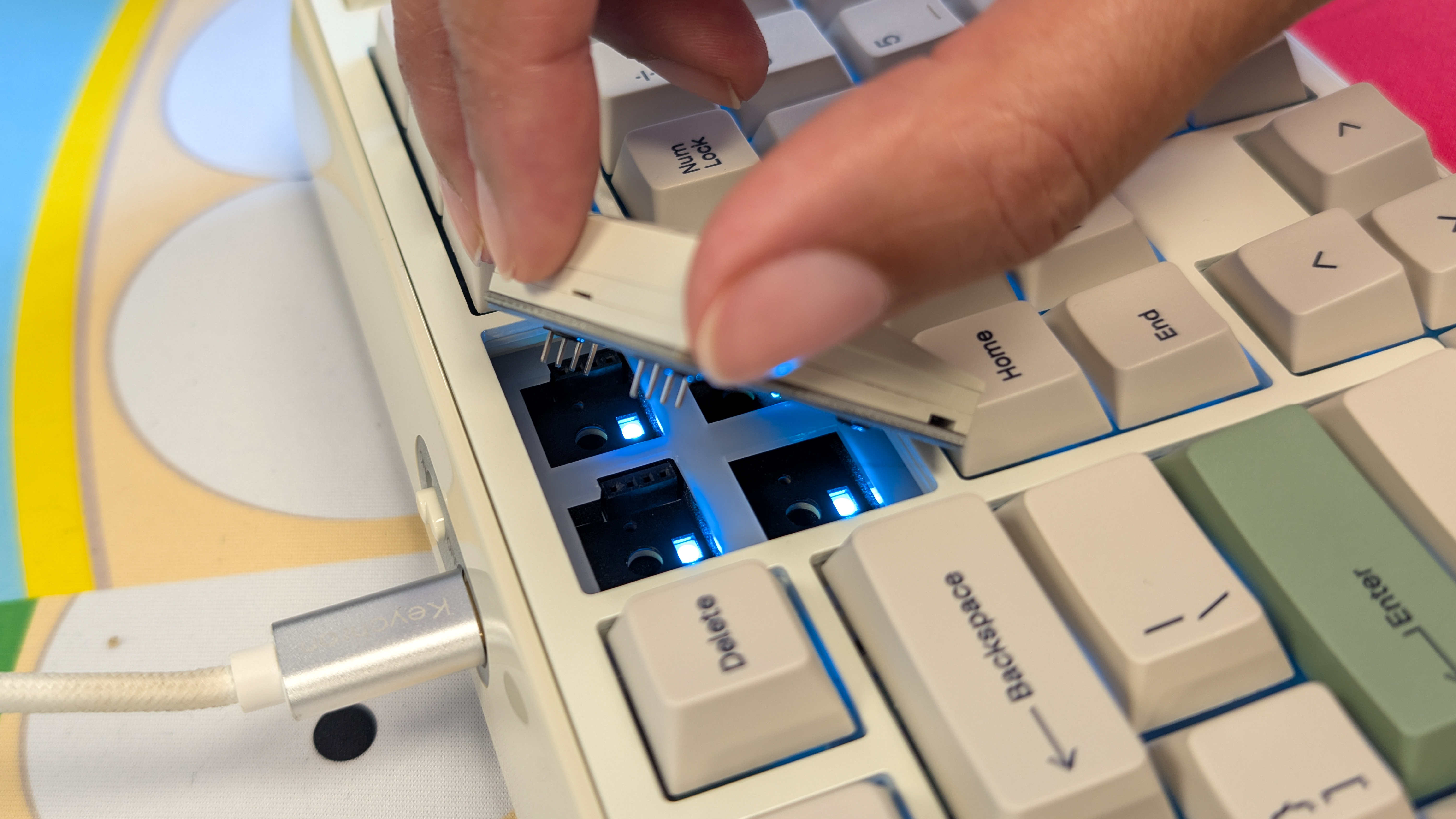 A white Epomaker RT100 Pro wireless mechanical keyboard