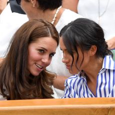 london, england july 14 catherine, duchess of cambridge and meghan, duchess of sussex attend day twelve of the wimbledon tennis championships at the all england lawn tennis and croquet club on july 14, 2018 in london, england photo by karwai tangwireimage