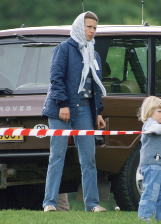 Princess Anne With Her Children, Zara And Peter Phillips At The Windsor Horse Show. Police Bodyguard Watches Over Them From Range Rover in 1985