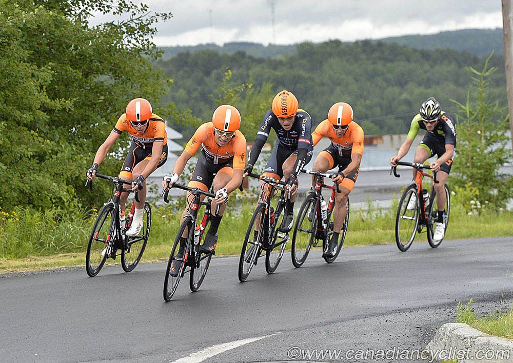 Ben Perry (Silber Pro Cycling) at the front of a small early break group