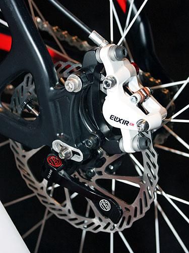 Pivoting dropouts supposedly will handle up to a four-tooth cog spread without having to alter chain length.