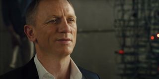 Daniel Craig smirks while being held captive in Skyfall.