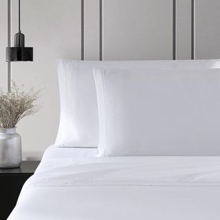 Cotton Sateen Sheets on a bed.