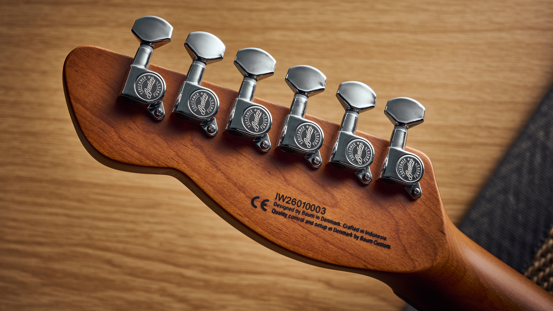 The back of the headstock showing the Performer tuning machines of the Baum Guitars Verve