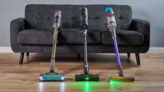 Shark PowerDetect, Roborock H60 Hub Ultra and Dyson Gen5detect vacuums with their headlamps illuminated