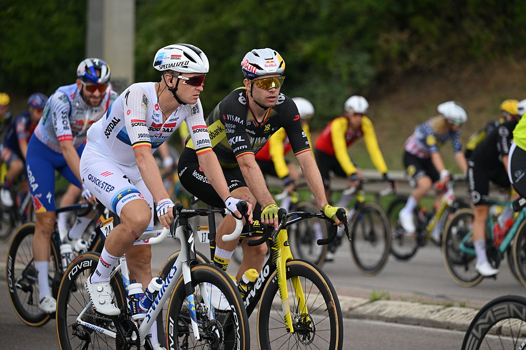 PARIS - CHAMPS-ELYSEES, FRANCE - JULY 27: (L-R) Tim Merlier of Belgium and Team Soudal Quick-Step and Wout Van Aert of Belgium and Team Visma | Lease a Bike compete during the 112th Tour de France 2025, Stage 21 a 132.3km stage from Mantes-la-Ville to Paris - Champs-Elysees / #UCIWT / on July 27, 2025 in Paris - Champs-Elysees, France.