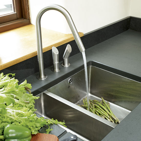 kitchen with black counter and sink