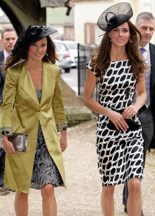 Kate and Pippa Middleton at a friend's wedding in 2011