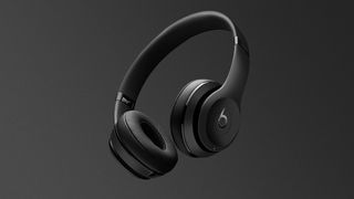 A pair of Beats Solo3 Wireless headphones on a black background.