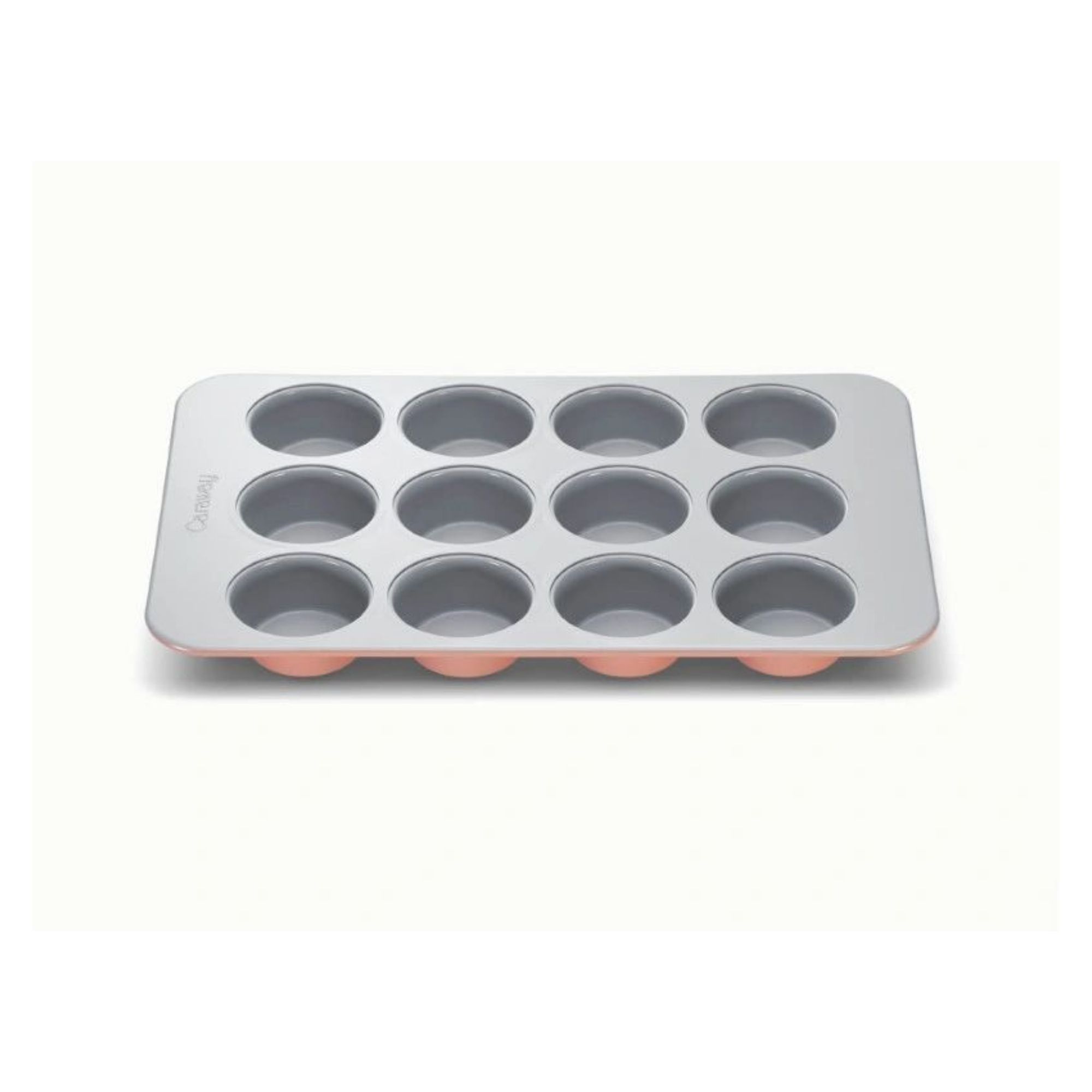 A pink 12 hole muffin tray