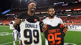 Defensive end Myles Garrett and defensive tackle Aaron Donald posing for a picture in 2019