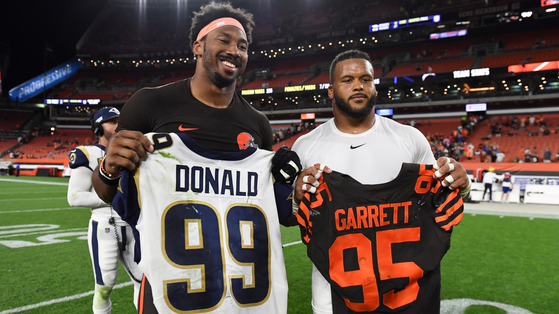 Defensive end Myles Garrett and defensive tackle Aaron Donald posing for a picture in 2019