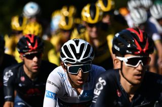 Team Ineos rider Colombias Egan Bernal wearing the best youngs white jersey rides in the pack during the 13th stage of the 107th edition of the Tour de France cycling race 191 km between ChatelGuyon and Puy Mary on September 11 2020 Photo by Marco Bertorello AFP Photo by MARCO BERTORELLOAFP via Getty Images