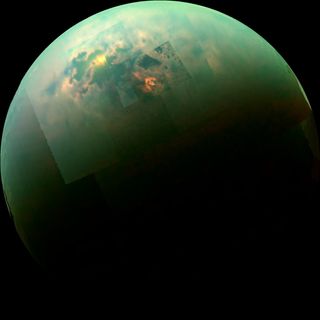 The sun lights up patches of the seas around the northern pole of Saturn's moon, Titan.