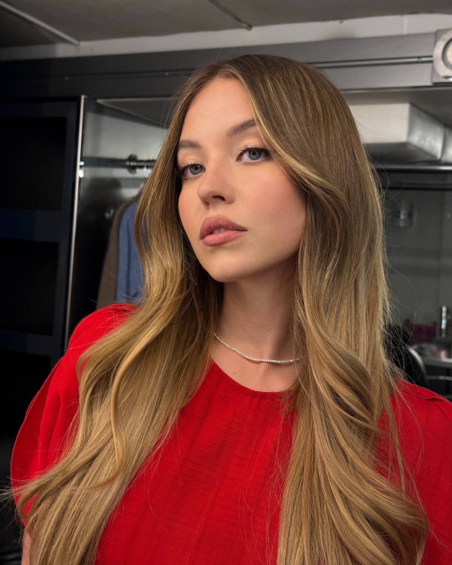 Sydney Sweeney with dark blonde hair colour