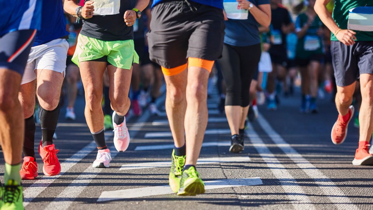 Lots of runners legs running a marathon